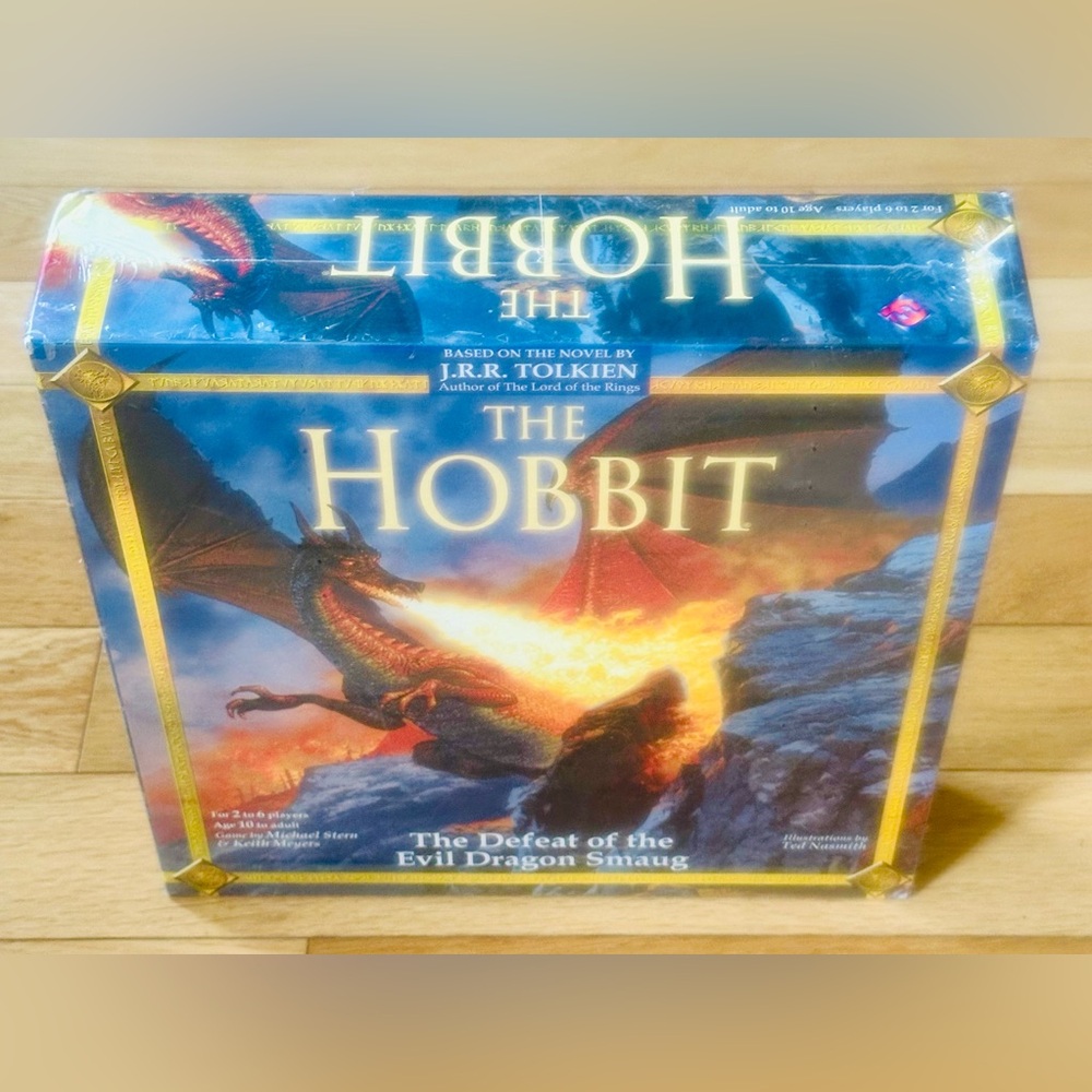 New In Sealed Box 
The Hobbit Board Game 
“Defeat of the Evil Dragon Smaug”